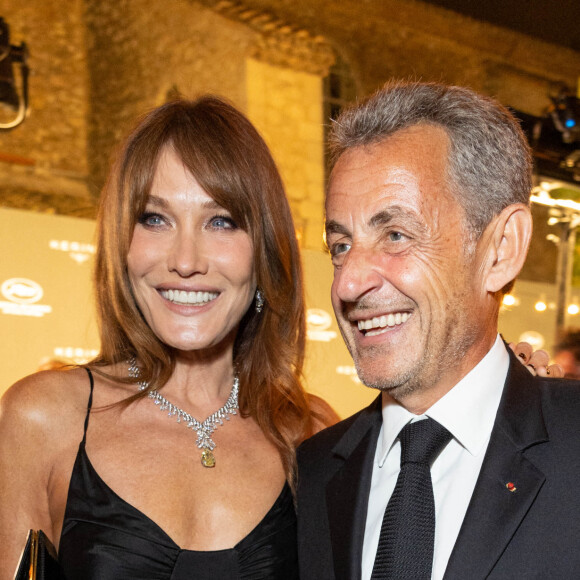 Carla Bruni-Sarkozy et son mari Nicolas Sarkozy - 19ème "Diner de la Mode" au bénéfice de Sidaction au Pavillon Cambon Capucines dans le cadre de la Fashion Week de Paris, France. Le 7 juillet 2022. © / Bestimage