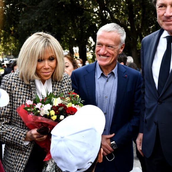 Brigitte Macron, Didier Deschamps et Christian Estrosi, le maire de Nice, durant la clôture nationale de l'opération Pièces Jaunes 2022, sur la colline du Château à Nice, le 4 février 2022.© Bruno Bebert / Bestimage