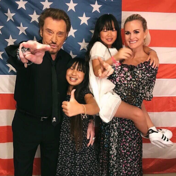 Johnny et Laeticia Hallyday avec leurs filles Jade et Joy.