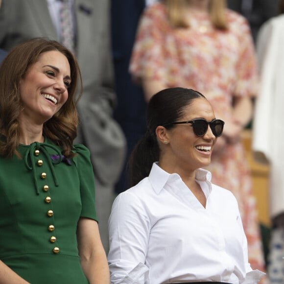 Catherine (Kate) Middleton, duchesse de Cambridge, Meghan Markle, duchesse de Sussex, et Pippa Middleton dans les tribunes lors de la finale femme de Wimbledon "Serena Williams - Simona Halep (2/6 - 2/6) à Londres, le 13 juillet 2019. 