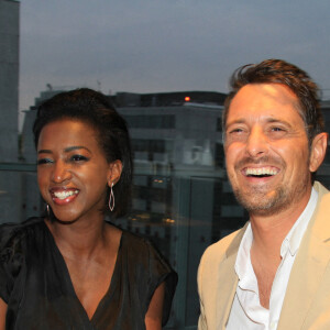 Exclusif - Hapsatou Sy et son mari Vincent Cerruti - Le Grand Dîner du 14 juillet, sur le rooftop de l'hôtel Pullman Tour Eiffel à Paris, France, le 14 juillet 2021. © Philippe Baldini/Bestimage 