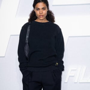 Tina Kunakey au photocall du défilé "Fila X Haider Ackermann" à Manchester, le 17 novembre 2022. 