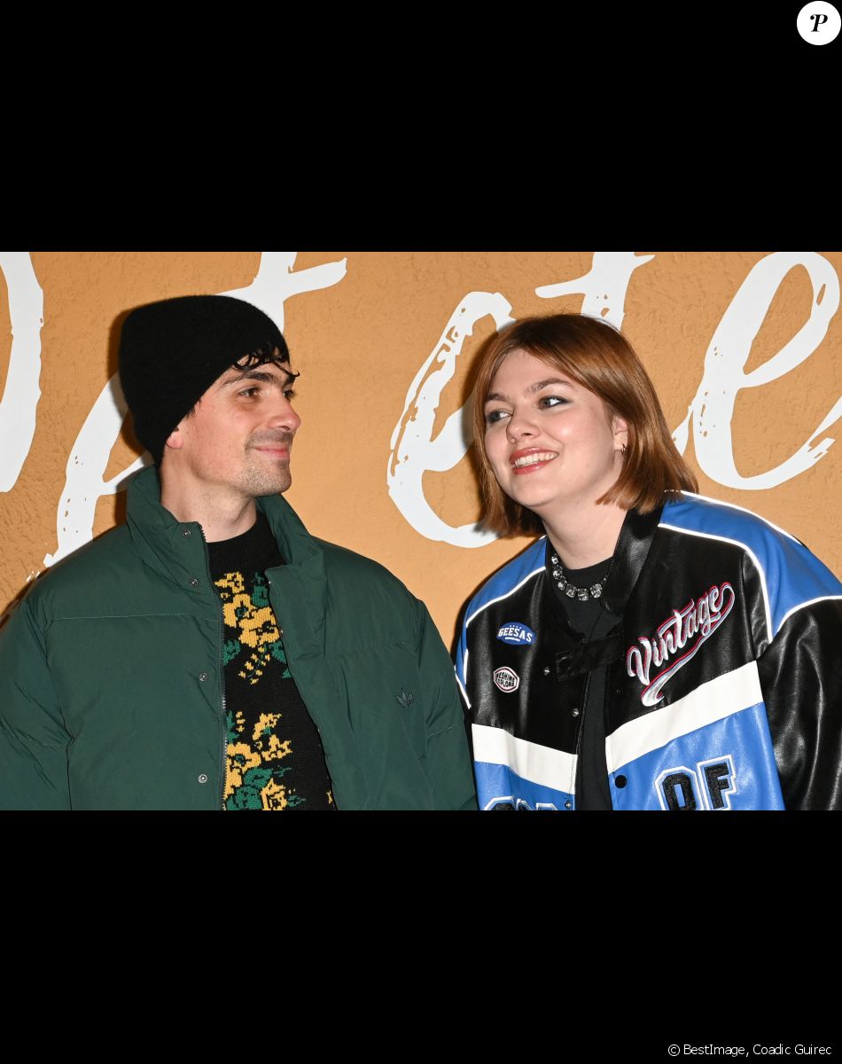 Florian Rossi et sa compagne Louane Emera - Avant-première du film "Cet été-là" au cinéma Pathé Wepler à Paris le 3 janvier 2022. © Coadic Guirec/Bestimage