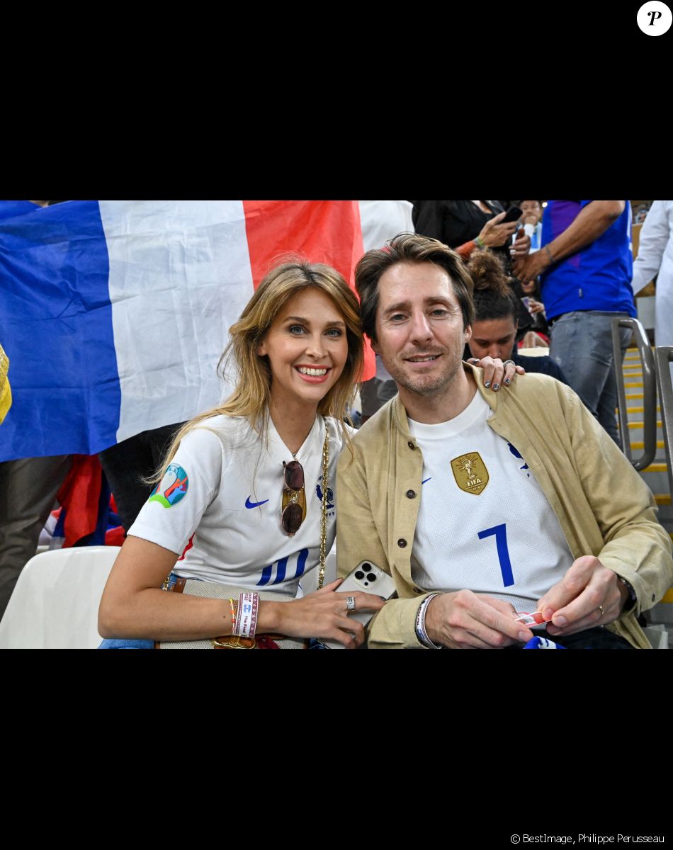 Ophélie Meunier et son mari Mathieu Vergne dans les tribunes du match "France - Argentine (3-3 - tab 2-4)" en finale de la Coupe du Monde au Qatar. © Philippe Perusseau / Bestimage