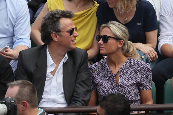 Arthur Sadoun et sa femme Anne-Sophie Lapix - People dans les tribunes des Internationaux de France de Tennis de Roland Garros à Paris. Le 9 juin 2018 © Cyril Moreau / Bestimage 