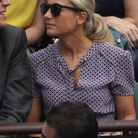 Arthur Sadoun et sa femme Anne-Sophie Lapix - People dans les tribunes des Internationaux de France de Tennis de Roland Garros à Paris. Le 9 juin 2018 © Cyril Moreau / Bestimage 