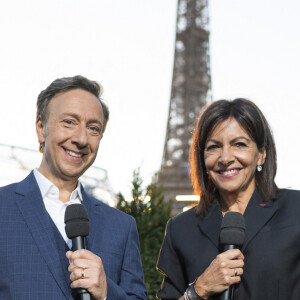 Exclusif - Stéphane Bern (Chaussures Louboutin aux couleurs Bleu Blanc Rouge) et Anne Hildalgo - Enregistrement de l'émission "Le concert de Paris" à la Tour Eiffel pour le 14 Juillet à Paris, diffusé sur France 2 © Pierre Perusseau-Tiziano da Silva / Bestimage 