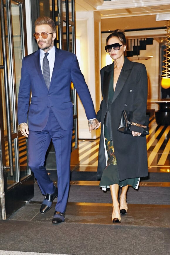 David Beckham et sa femme Victoria (Posh) à la sortie de leur hôtel à New York, le 11 octobre 2022. 