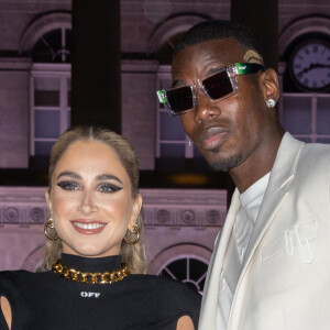 Paul Pogba et sa femme Maria Zulay Salaues - Arrivées et sorties du défilé Off-White Femme Automne/hiver au palais Brongniart à Paris, France. © Jeremy Melloul / Bestimage