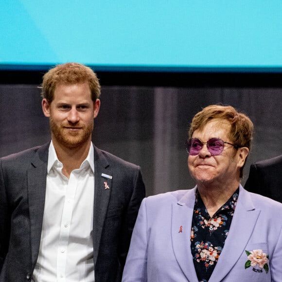 Elton John et le prince Harry participent à la conférence internationale "AIDS" à Amsterdam aux Pays-Bas le 24 juillet 2018.