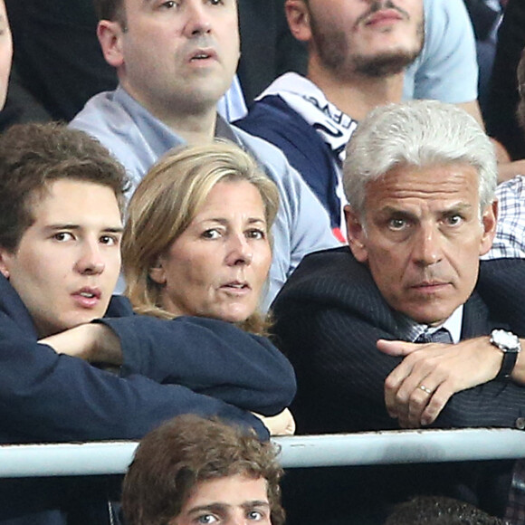 Exclusif - Claire Chazal avec son fils François Poivre d'Arvor et un ami le banquier Christophe de Backer assistent au quart finale de la Ligue des Champions de football au Parc des Princes entre le PSG et le FC Barcelone à Paris le 15 avril 2015. 