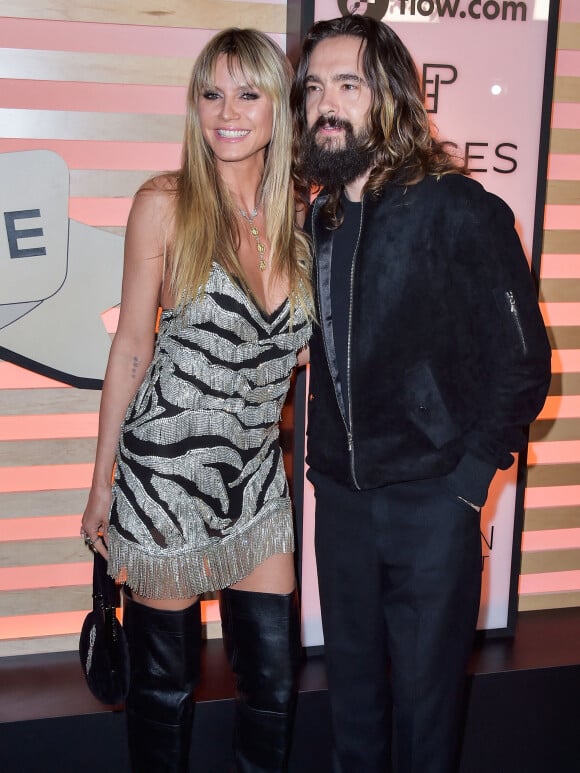 Heidi Klum et son mari Tom Kaulitz au photocall "Homecoming Weekend" au Pacific Center à Los Angeles, le 12 février 2022. 