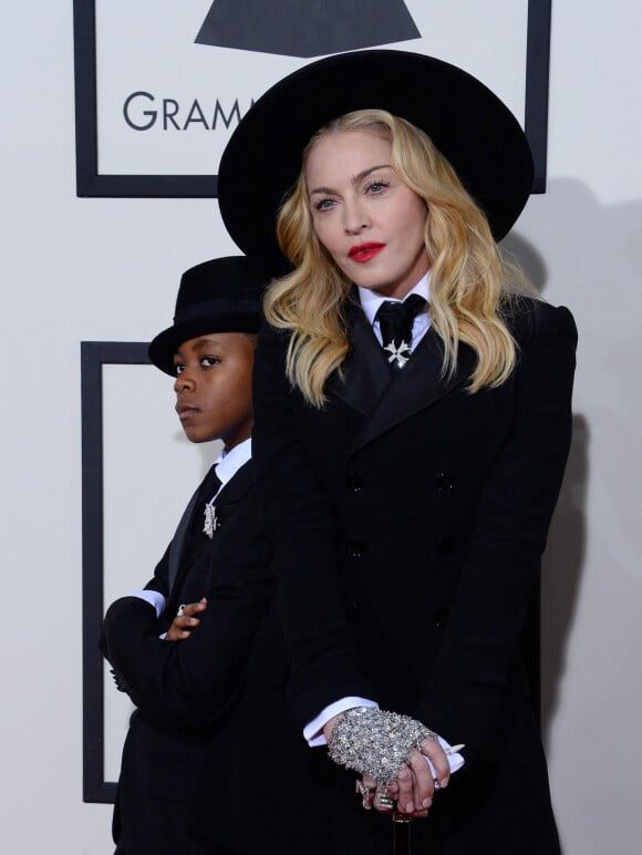 La chanteuse aurait jeté son dévolu sur un sportif 
Madonna et son fils David Banda Mwale - 56eme ceremonie des Grammy Awards a Los Angeles, le 26 janvier 2014.