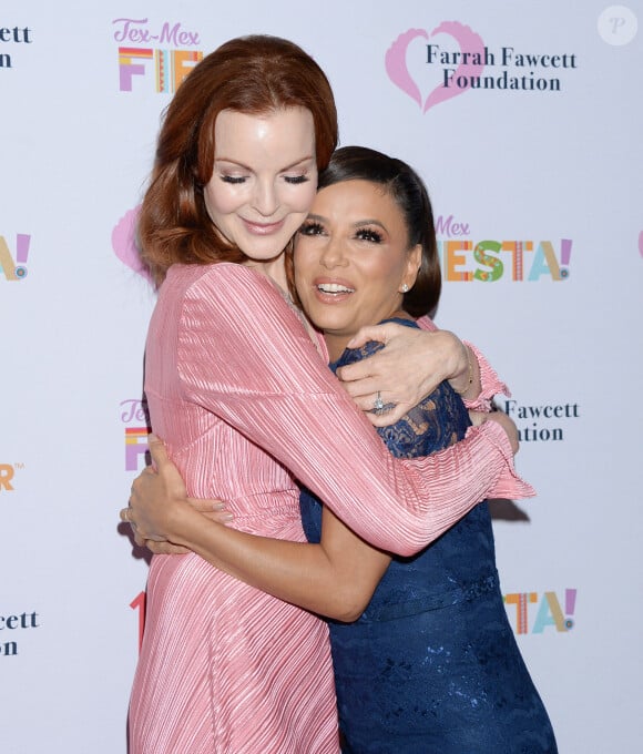 Marcia Cross et Eva Longoria au photocall du gala caritatif "Farrah Fawcett Foundation" au Wallis Annenberg Center for the Performing Arts à Los Angeles, le 6 septembre 2019. 