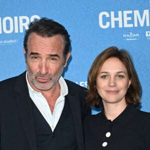 Jean Dujardin et sa compagne Nathalie Péchalat - Avant-première du film "Sur les chemins noirs" au cinema UGC Normandie à Paris le 13 mars 2023. © Coadic Guirec/Bestimage 