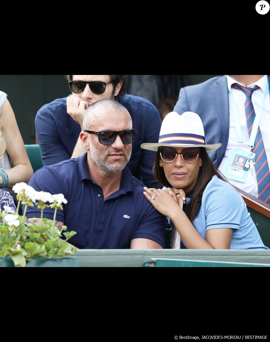 Patrick Antonelli est quant à lui originaire de Marseille...
Amel Bent et son mari Patrick Antonelli dans les tribunes des internationaux de tennis de Roland Garros à Paris, France, le 3 juin 2018. © Dominique Jacovides - Cyril Moreau/Bestimage