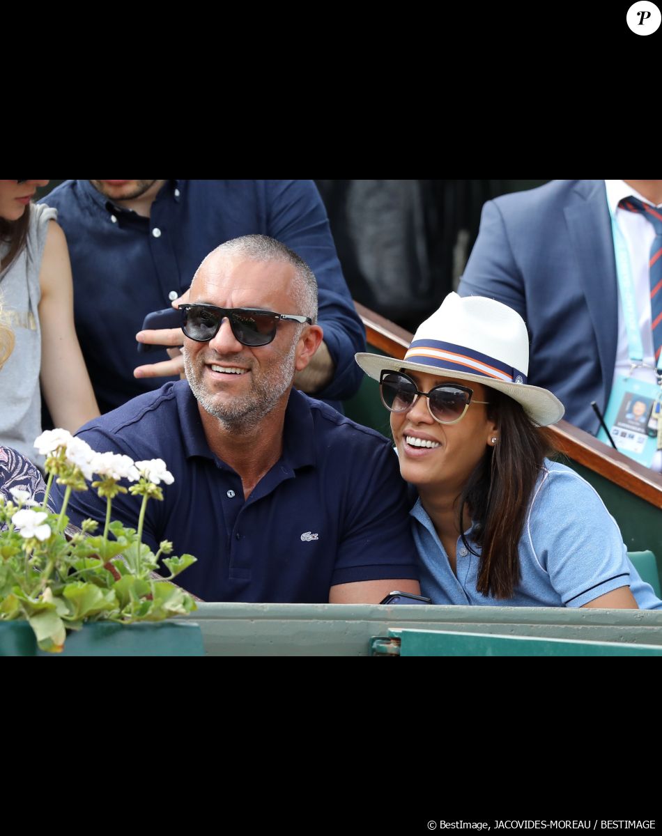 Amel Bent est l'heureuse maman de trois enfants avec Patrick Antonelli : Sofia, Hana et Zayn.
Amel Bent et son mari Patrick Antonelli dans les tribunes des internationaux de tennis de Roland Garros à Paris, France, le 3 juin 2018. © Dominique Jacovides - Cyril Moreau/Bestimage
