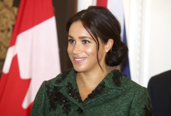 Meghan Markle la duchesse de Sussex enceinte et le prince Harry, duc de Sussex, assistent à une activité jeunesse le Jour du Commonwealth à la Maison du Canada le 11 mars 2019 à Londres