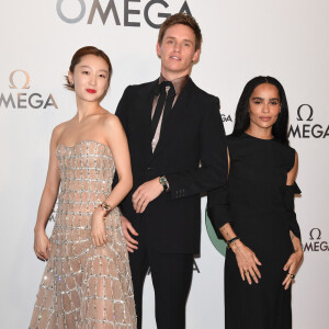 Eddie Redmayne,Zhou Dongyu et Zoe Kravitz lors de la soirée de lancement "Omega Aqua Terra Shades" à la Somerset House à Londres. Le 22 mars 2023