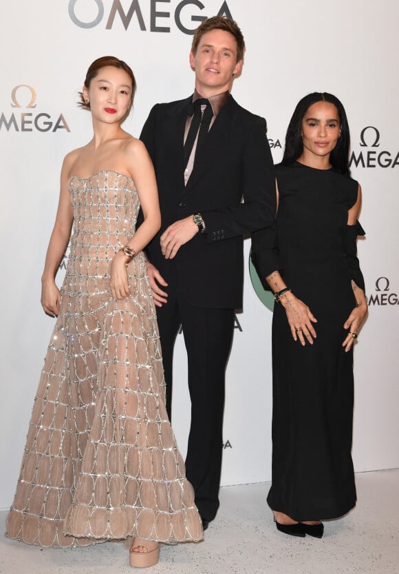 Eddie Redmayne,Zhou Dongyu et Zoe Kravitz lors de la soirée de lancement "Omega Aqua Terra Shades" à la Somerset House à Londres. Le 22 mars 2023