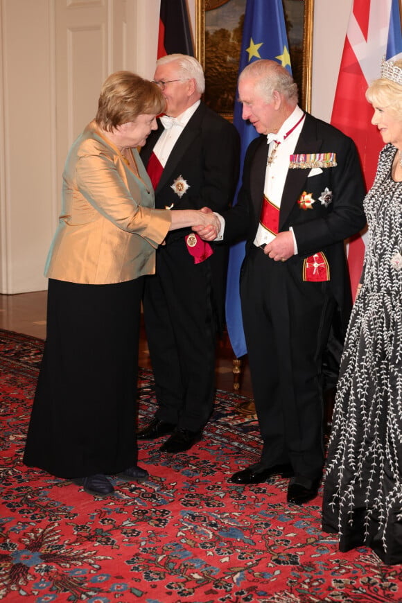 L'ancienne chancelière allemande Angela Merkel, Frank Walter Steinmeier, le roi Charles III d'Angleterre, la reine consort Camilla Parker Bowles - Personnalités au dîner d'état donné par le président allemand et sa femme en l'honneur du roi d'Angleterre et de la reine consort, au Château Bellevue à Berlin, à l'occasion du premier voyage officiel du roi d'Angleterre en Europe. Le 29 mars 2023