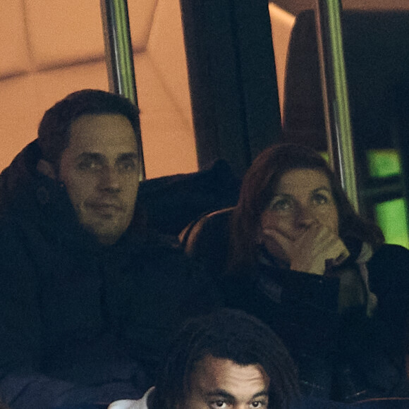 Grand Corps Malade et sa femme Julia Marsaud - People dans les tribunes lors du match de championnat de Ligue 1 Uber Eats opposant le Paris Saint-Germain (PSG) à l'Olympique Lyonnais au Parc des Princes à Paris le 2 avril 2023.