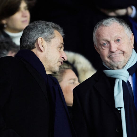 Nicolas Sarkozy, Jean-Michel Aulas - People dans les tribunes lors du match de championnat de Ligue 1 Uber Eats opposant le Paris Saint-Germain (PSG) à l'Olympique Lyonnais au Parc des Princes à Paris le 2 avril 2023.