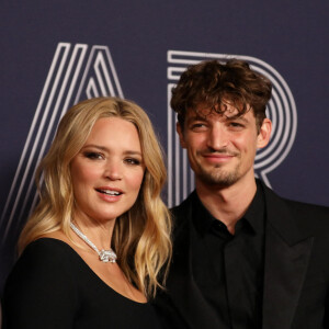 Virginie Efira et son compagnon Niels Schneider (en YSL) - Photocall de la 47ème édition de la cérémonie des César à l'Olympia à Paris, le 25 février 2022. © Borde-Jacovides/Bestimage 