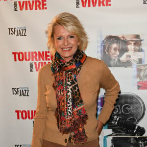 Sophie Davant - Photocall à la première du film "Tourner pour vivre" sur la vie cinématographique du réalisateur C.Lelouch à Paris. © Coadic Guirec / Bestimage