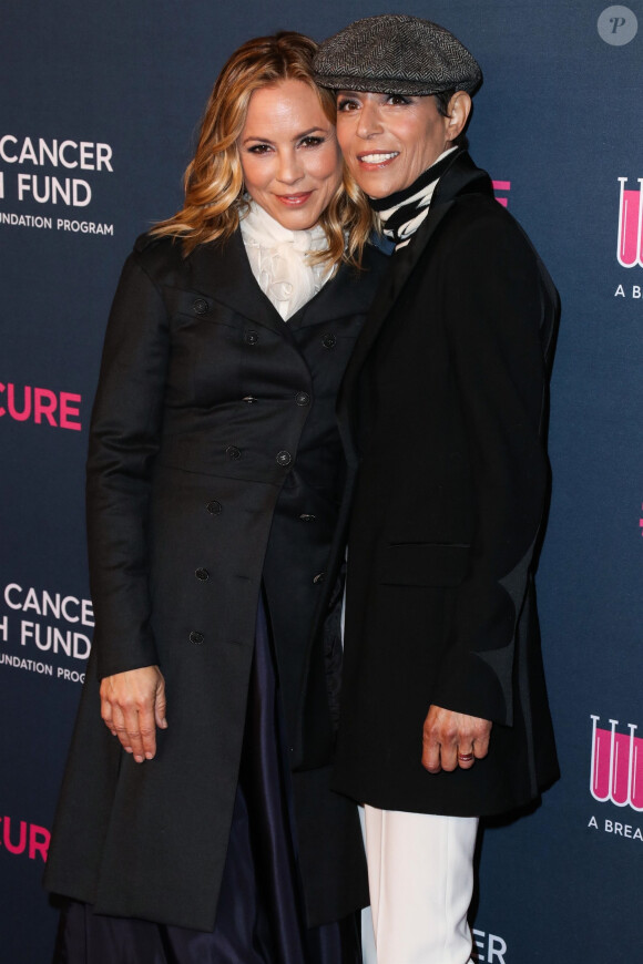 Maria Bello et sa fiancée Dominique Crenn au photocall de la soirée "Women's Cancer Research Fund" à Los Angeles, le 27 février 2020. 