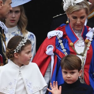 La princesse Charlotte de Galles et Le prince Louis de Galles - La famille royale britannique salue la foule sur le balcon du palais de Buckingham lors de la cérémonie de couronnement du roi d'Angleterre à Londres le 5 mai 2023. 