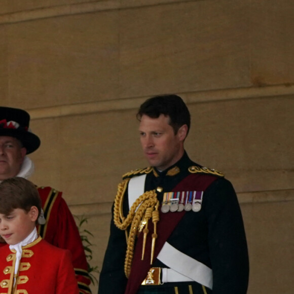 Le roi Charles III d'Angleterre et Le prince George de Galles - Sortie de la cérémonie de couronnement du roi d'Angleterre à l'abbaye de Westminster de Londres, Royaume Uni, le 6 mai 2023. 