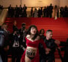 Elle a rapidement été arrêtée. 
Incident lors de la montée des marches du film " Le retour (Homecoming) " lors du 76ème Festival International du Film de Cannes. Le 17 mai 2023 © Jacovides-Moreau / Bestimage 