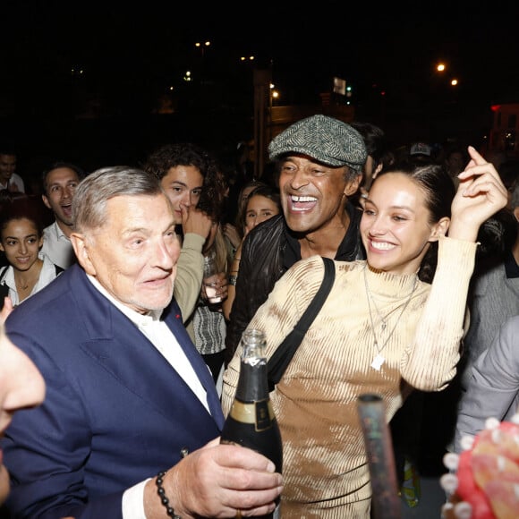 Exclusif - Jean-Claude Camus (boit à la bouteille), Yannick Noah et sa fille Jenaye lors de la soirée d'anniversaire de Joalukas Noah, fils de Yannick Noah et Isabelle Camus, pour ses 18 ans à Paris le 10 juin 2022. © Cyril Moreau / Bestimage