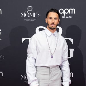 Baptiste Giabiconi - Photocall de la première édition du dîner de charité "Together we Give" sur la Plage "La Môme"lors du 76ème Festival International du Film de Cannes le 23 mai 2023.© Jeremy Melloul/Bestimage