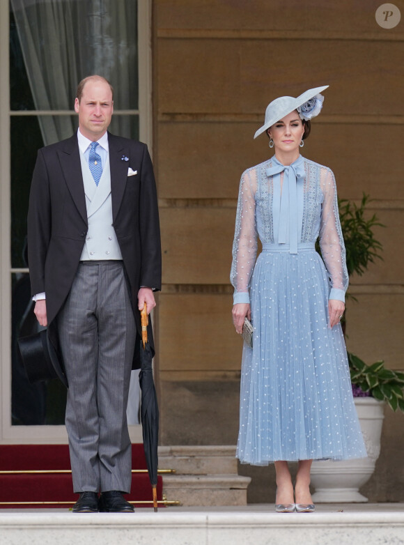Un sobriquet qui ne devrait pas plaire à son épouse Kate Middleton, qui garde toujours un oeil sur ses rivales ! 
Le prince William, prince de Galles, et Catherine (Kate) Middleton, princesse de Galles, lors d'une Garden Party au palais de Buckingham à Londres, Royaume Uni, le 9 mai 2023, pour célébrer le couronnement du roi et de la reine d'Angleterre. 
