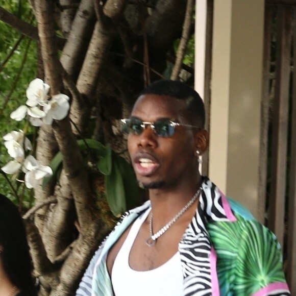 Paul Pogba - Deux des soeurs Kardashian, S.Williams, P.Pogba quittent le restaurant "Swan" à Miami, en marge de la foire d'art contemporain "Art Basel" à Miami. Kim Kardashian a finalisé les statuts de son divroce avec K.West (Ye) cette semaine et se détend avec ses amis. Le 2 décembre 2022.