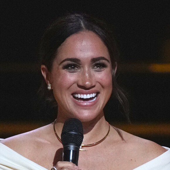 Le prince Harry et Meghan Markle lors de la cérémonie d'ouverture des Invictus Games 2020 à La Haye, le 16 avril 2022. 