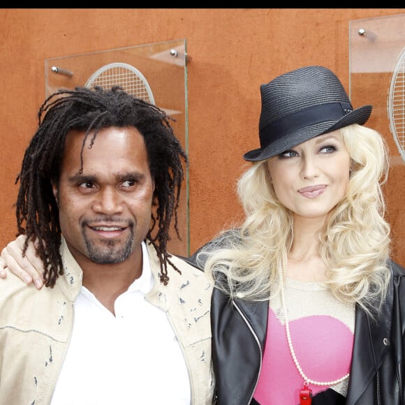  A l'époque elle venait d'épouser le footballeur Christian Karembeu. 
Adriana et Christian Karembeu - Finale hommes des Internationaux de France de tennis de Roland-Garros 2010.