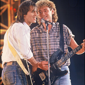 Jean-Jacques Goldman et Michael Jones, sur scène en 1987. © Agence / Bestimage