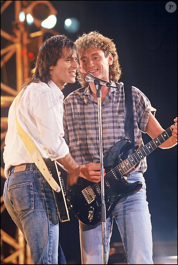 Jean-Jacques Goldman et Michael Jones, sur scène en 1987. © Agence / Bestimage