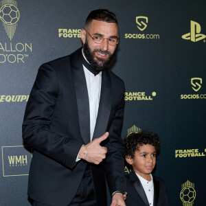 Karim Benzema part du Real, son fils très fier
Karim Benzema et son fils Ibrahim - Photocall de la 66ème cérémonie du Ballon d'Or au Théâtre du Chatelet à Paris. © Cyril Moreau/Bestimage