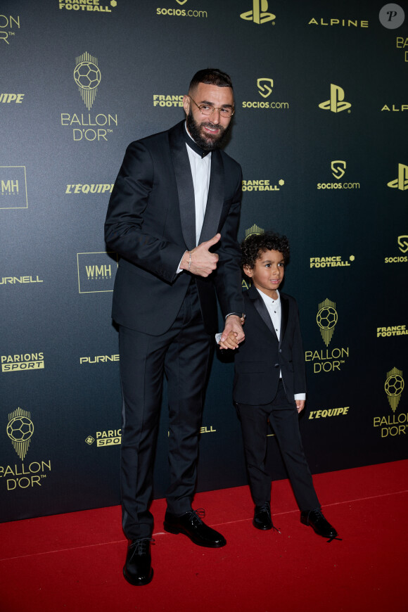 Karim Benzema part du Real, son fils très fier
Karim Benzema et son fils Ibrahim - Photocall de la 66ème cérémonie du Ballon d'Or au Théâtre du Chatelet à Paris. © Cyril Moreau/Bestimage