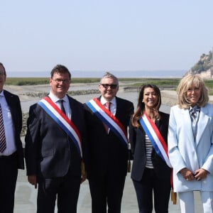 Emmanuel et Brigitte Macron se rendent au Mont Saint-Michel, le 5 juin 2023, à l'occasion de la célébration du millénaire de l'église abbatiale. © Stéphane Lemouton / Bestimage