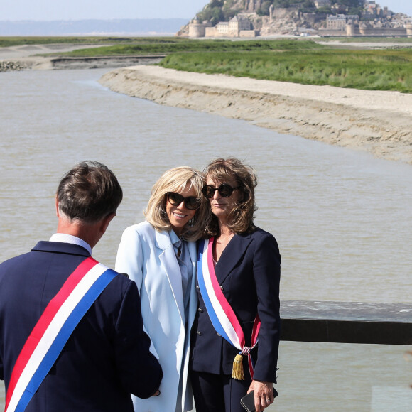 Emmanuel et Brigitte Macron se rendent au Mont Saint-Michel, le 5 juin 2023, à l'occasion de la célébration du millénaire de l'église abbatiale. © Stéphane Lemouton / Bestimage