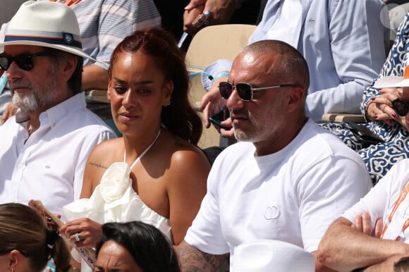 Amel Bent, Patrick Antonelli dans les tribunes de Roland-Garros le 10 juin 2023. Photo by Nasser Berzane/ABACAPRESS.COM