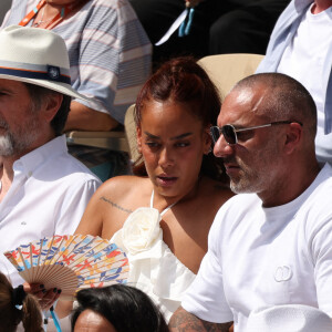 Amel Bent, Patrick Antonelli dans les tribunes de Roland-Garros le 10 juin 2023. Photo by Nasser Berzane/ABACAPRESS.COM