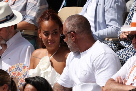 Amel Bent, Patrick Antonelli dans les tribunes de Roland-Garros le 10 juin 2023. Photo by Nasser Berzane/ABACAPRESS.COM