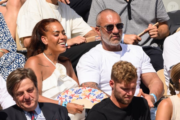 Amel Bent, Patrick Antonelli dans les tribunes de Roland-Garros le 10 juin 2023. Photo by Laurent Zabulon/ABACAPRESS.COM