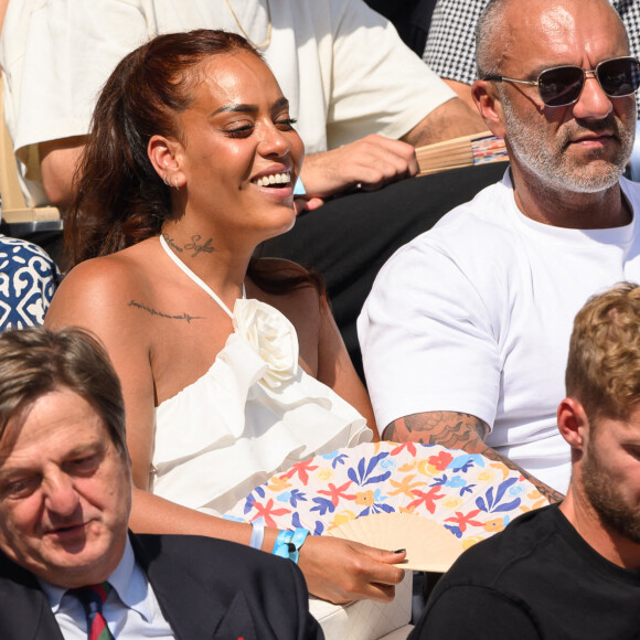 Amel Bent, Patrick Antonelli dans les tribunes de Roland-Garros le 10 juin 2023. Photo by Laurent Zabulon/ABACAPRESS.COM